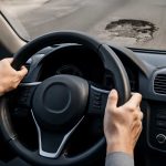 Почему руль уводит в сторону после наезда на яму